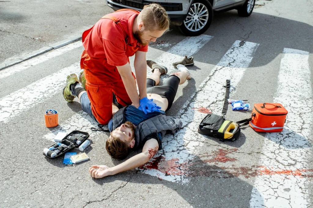 First aid instructor demonstrating emergency response techniques during training course